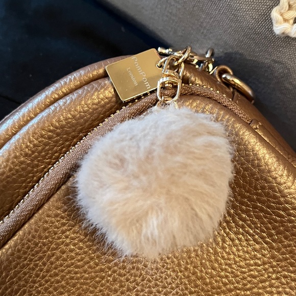 Gold Pebbled Crossbody Bag with Pom Pom - Picture 7 of 7